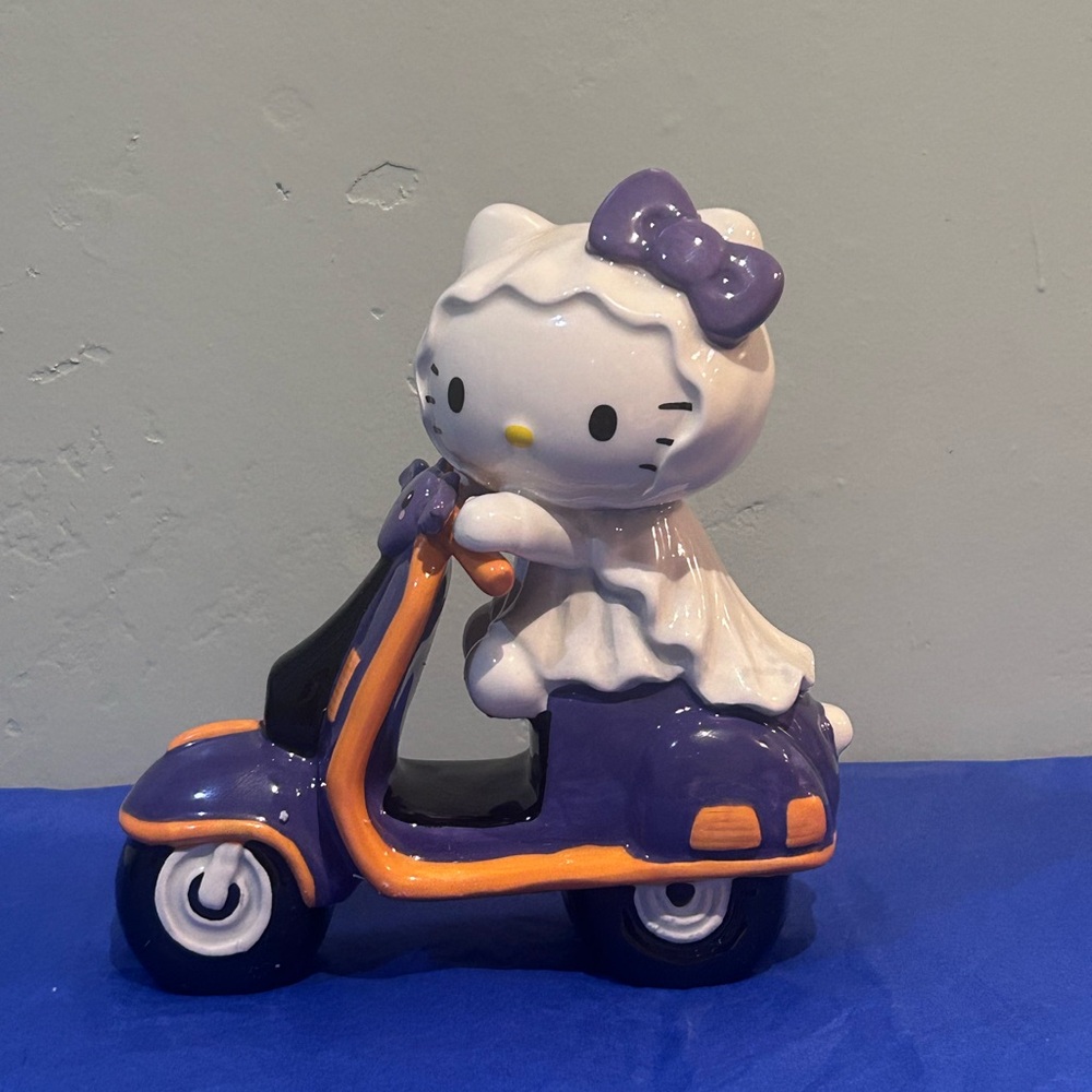 BlueSky Clayworks Hello Kitty Ceramic Bat Scooter Figurine